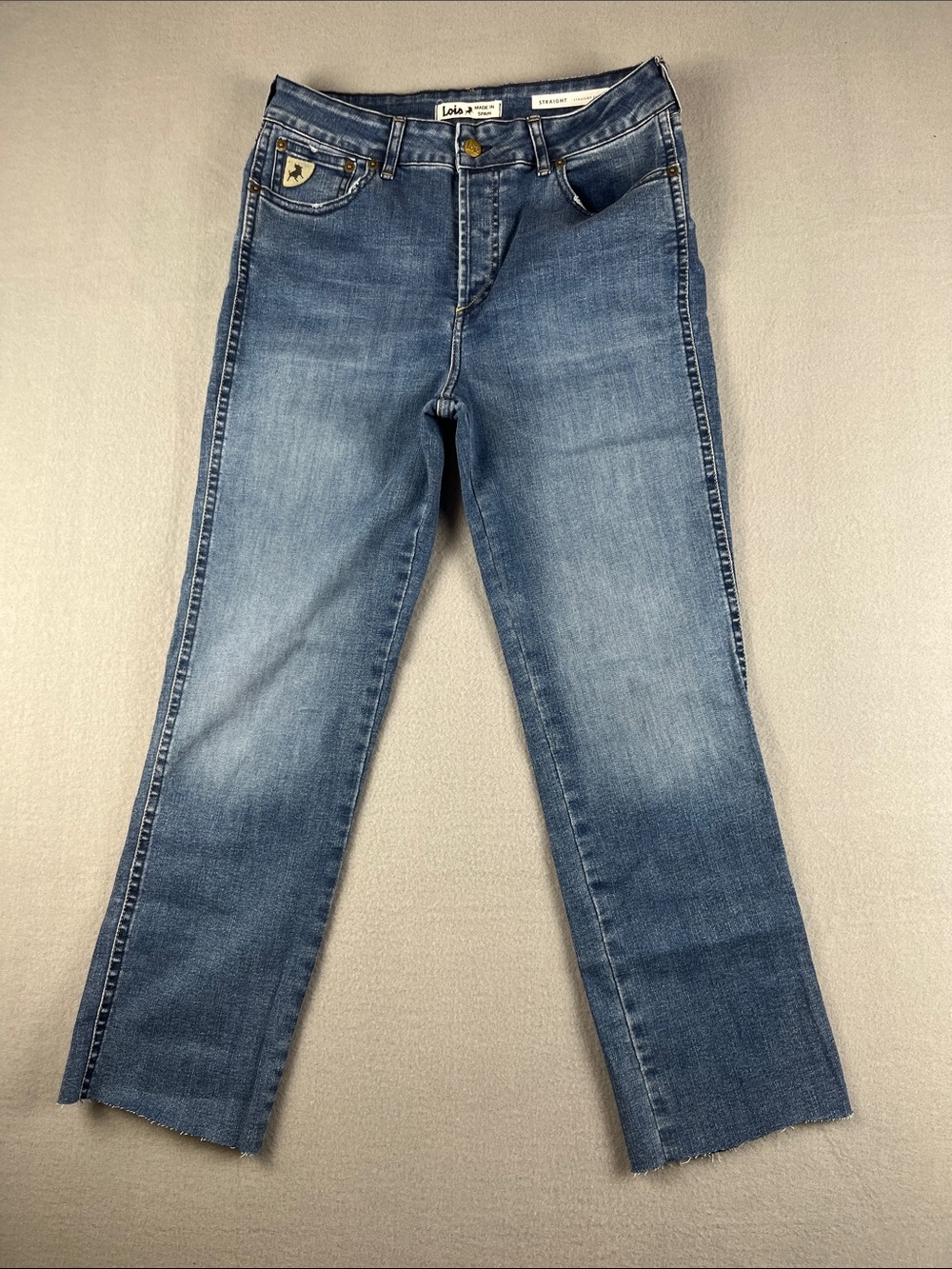 Lois High Rise  Straight-Leg Jeans in Medium Blue Wash with raw hem
Size: 29
